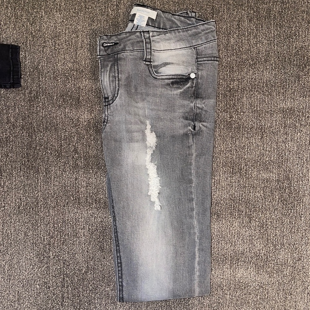 Size womens 0 jeans grey with rip tears cute